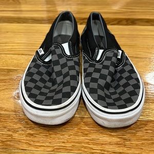 Black checkered slip on Vans. Women’s size 8 or Men’s size 6.5.